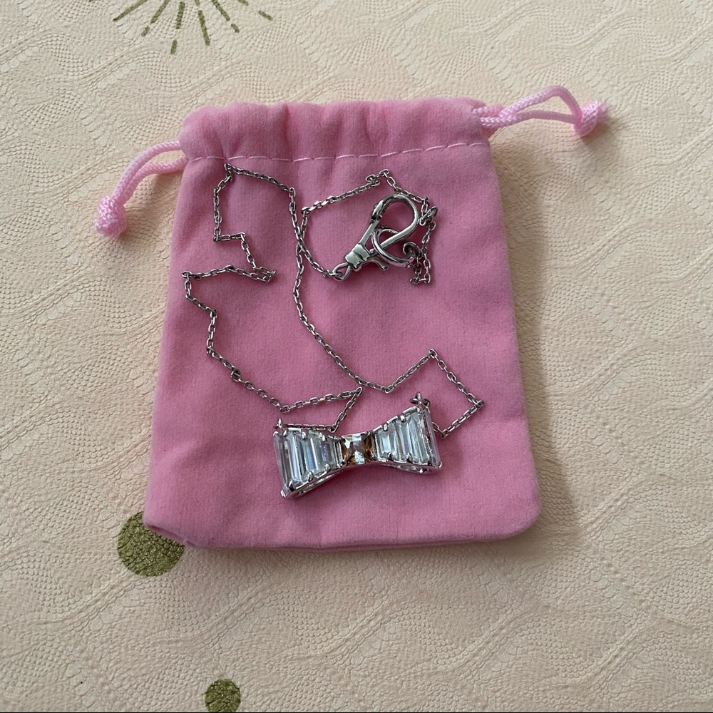 Henri Bendel bow bundle: necklace and ring size 6